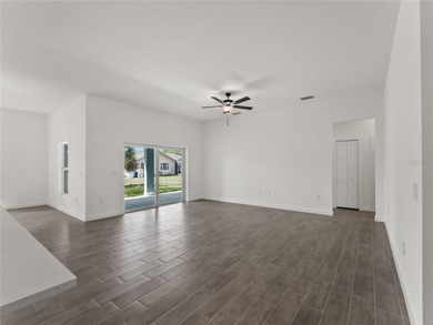 Tile throughout. Quartz countertops. Impact windows. Paver - photo 11