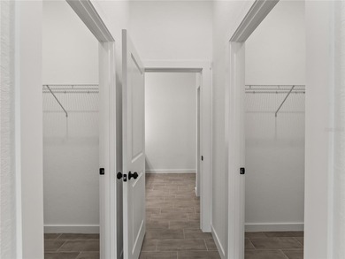 Tile throughout. Quartz countertops. Impact windows. Paver - photo 15