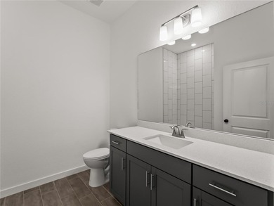 Tile throughout. Quartz countertops. Impact windows. Paver - photo 25