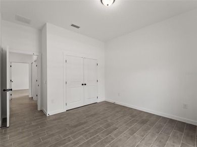 Tile throughout. Quartz countertops. Impact windows. Paver - photo 32