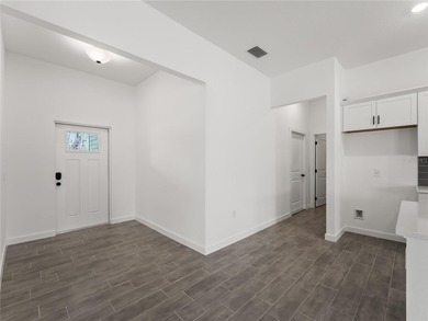Tile throughout. Quartz countertops. Impact windows. Paver - photo 33