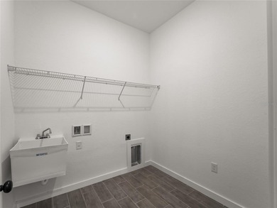 Tile throughout. Quartz countertops. Impact windows. Paver - photo 35