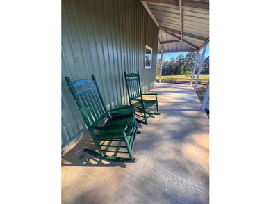 Country living at its finest unfolds across this breathtaking - photo 37