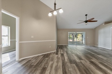 BEAUTIFULLY UPDATED 4 BR/2 BA LAKEFRONT HOME in DESIRABLE - photo 8