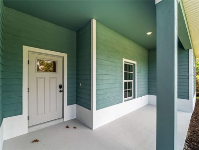 Tile throughout. Quartz countertops. Impact windows. Paver - photo 43