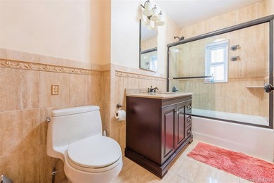 Excellent opportunity to own a well-maintained two-family home - photo 9