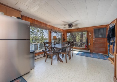 On the shores of beautiful Woman Lake, this home captures the - photo 7