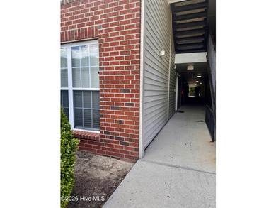 1st-floor end unit offers incredible potential and is ideally - photo 3