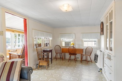 Tucked into a charming lake community, this property at 32 Ells - photo 14