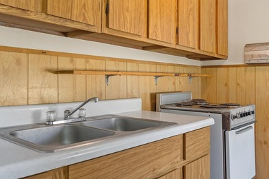 Tucked into a charming lake community, this property at 32 Ells - photo 18