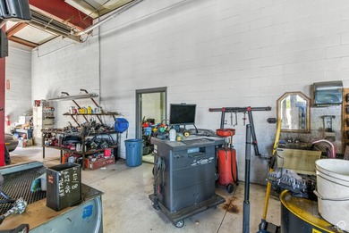This well-maintained automotive shop offers a rare opportunity - photo 20