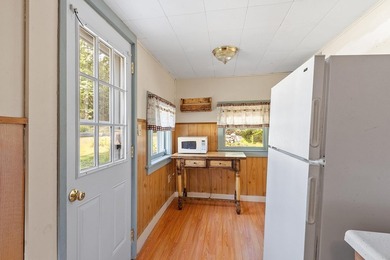 Tucked into a charming lake community, this property at 32 Ells - photo 21