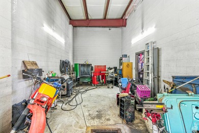 This well-maintained automotive shop offers a rare opportunity - photo 22