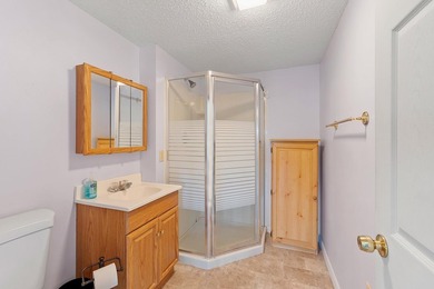 Tucked into a charming lake community, this property at 32 Ells - photo 25