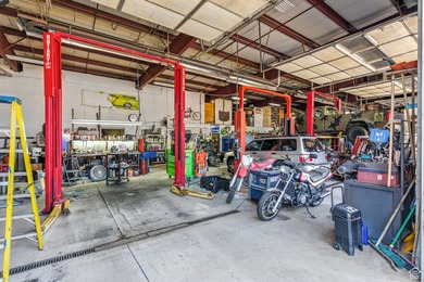 This well-maintained automotive shop offers a rare opportunity - photo 37