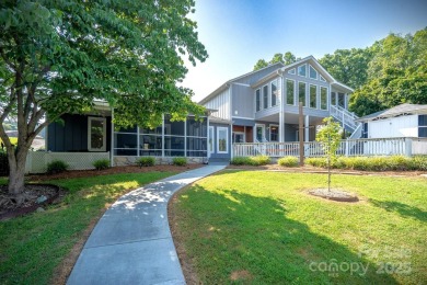 Welcome to your own fully furnished slice of lakefront paradise! - Lake Home For Sale in Norwood, North Carolina