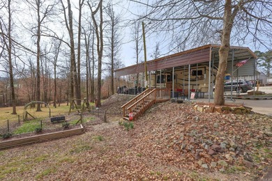 Conveniently located near Lake Greeson and area ATV trails, this - photo 14