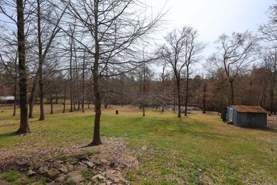 Conveniently located near Lake Greeson and area ATV trails, this - photo 16