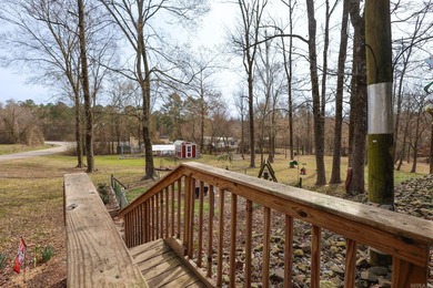 Conveniently located near Lake Greeson and area ATV trails, this - photo 17