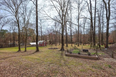 Conveniently located near Lake Greeson and area ATV trails, this - photo 18