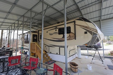 Conveniently located near Lake Greeson and area ATV trails, this - photo 21