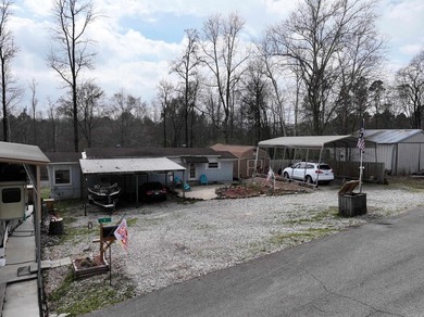 Conveniently located near Lake Greeson and area ATV trails, this - photo 37