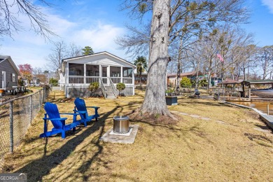 **Lakeside Elegance Meets Modern Comfort!**      Indulge in the - photo 2