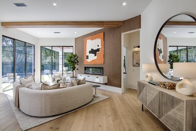 Step into this newly constructed residence that transcends the - photo 11