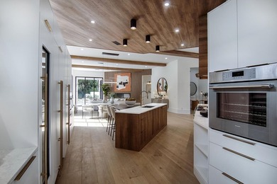 Step into this newly constructed residence that transcends the - photo 16