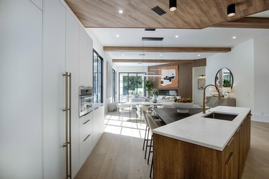 Step into this newly constructed residence that transcends the - photo 17