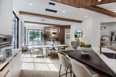 Step into this newly constructed residence that transcends the - photo 18