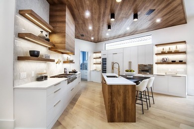 Step into this newly constructed residence that transcends the - photo 22