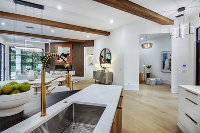 Step into this newly constructed residence that transcends the - photo 24