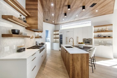 Step into this newly constructed residence that transcends the - photo 26