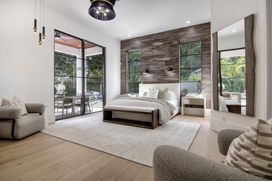 Step into this newly constructed residence that transcends the - photo 29