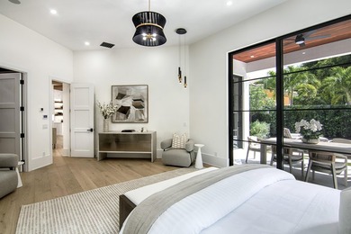 Step into this newly constructed residence that transcends the - photo 31
