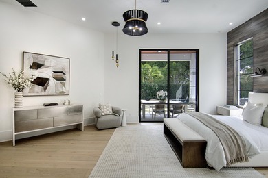 Step into this newly constructed residence that transcends the - photo 32