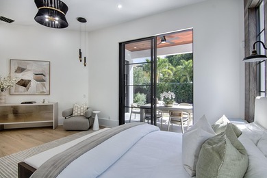 Step into this newly constructed residence that transcends the - photo 35