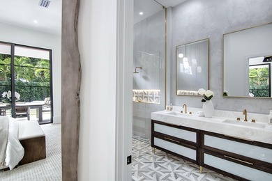 Step into this newly constructed residence that transcends the - photo 37