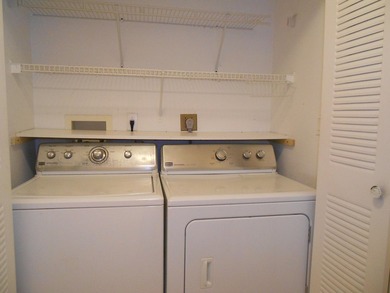 This 3-bedroom, 2-bath home includes a detached garage. Step - photo 11