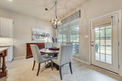 Set beneath mature trees on an oversized one-third-acre lot in - photo 12