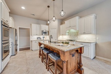 Set beneath mature trees on an oversized one-third-acre lot in - photo 13