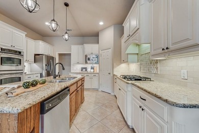Set beneath mature trees on an oversized one-third-acre lot in - photo 14