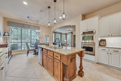 Set beneath mature trees on an oversized one-third-acre lot in - photo 15