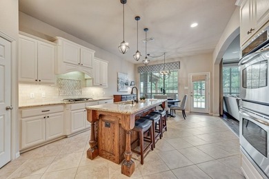 Set beneath mature trees on an oversized one-third-acre lot in - photo 16