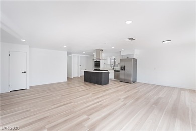 This beautifully renovated 2-bedroom, 2-bath home features a