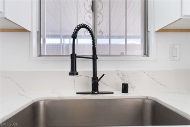 This beautifully renovated 2-bedroom, 2-bath home features a