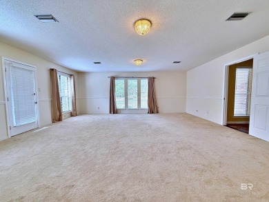 Welcome to Plantation Hills! This beautiful single story is now