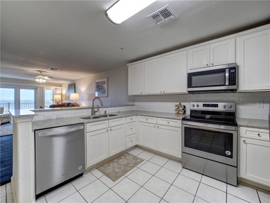 This beautifully updated 2-bedroom, 2-bath beachfront top floor - photo 4