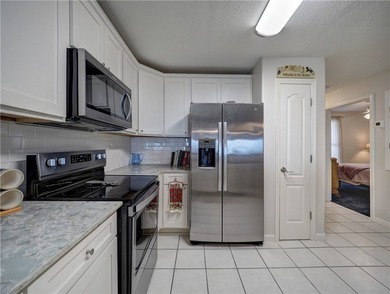 This beautifully updated 2-bedroom, 2-bath beachfront top floor - photo 5